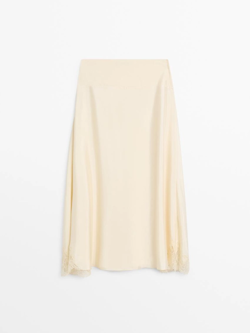 Асимметричная юбка с деталями из кружева