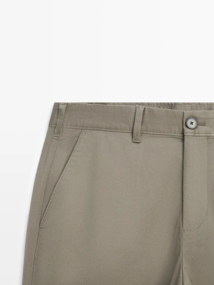 Брюки из хлопково-вискозной смеси в зауженном крое- Заказать в России