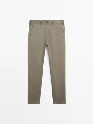 Брюки из хлопково-вискозной смеси в зауженном крое- Заказать в России