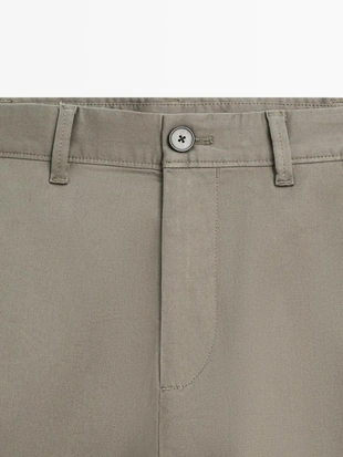 Брюки из хлопково-вискозной смеси в зауженном крое- Заказать в России