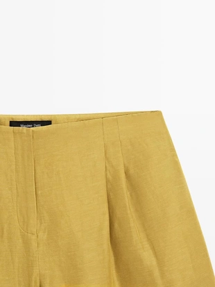 Шорты-бермуды из плотной смесовой ткани с отделкой в складку- Заказать в России