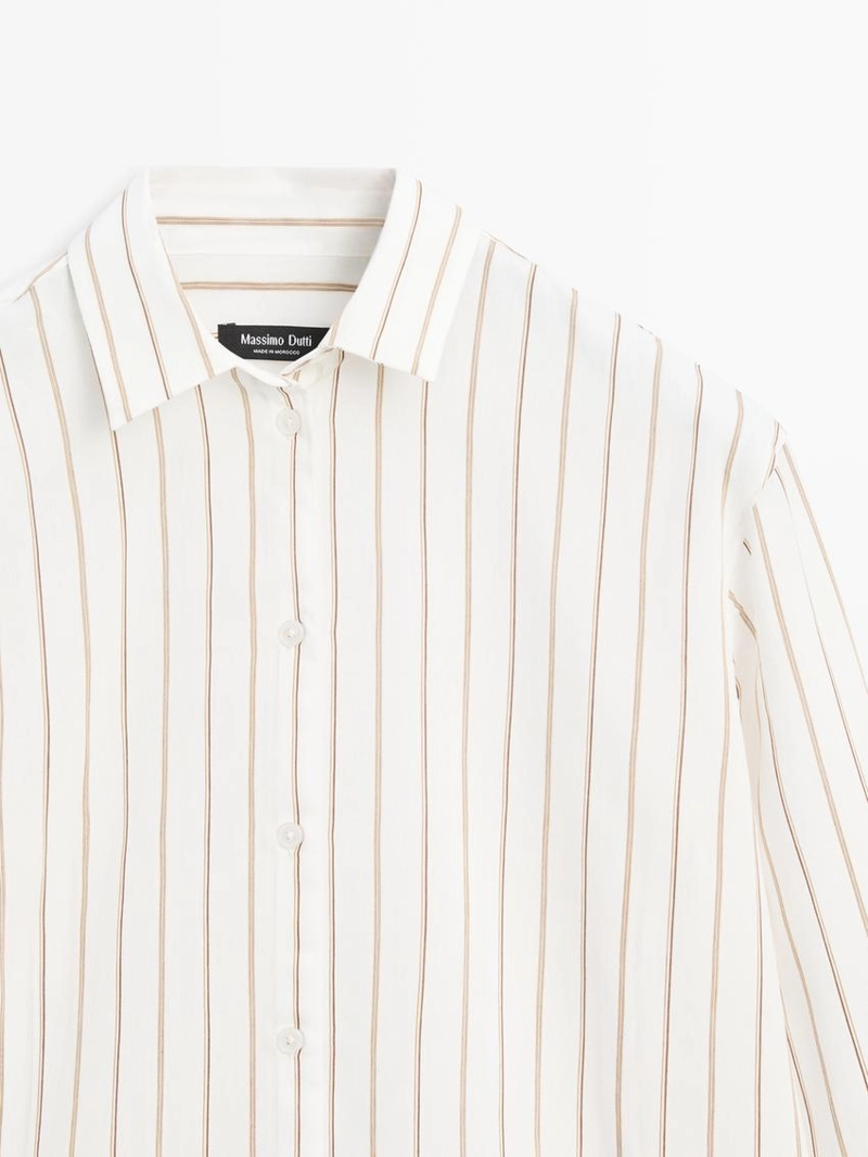 Рубашка в полоску белого цвета