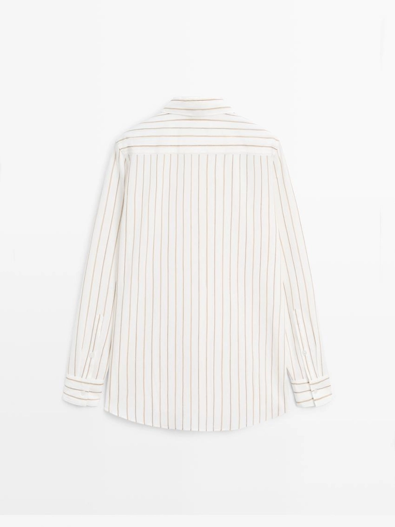Рубашка в полоску белого цвета