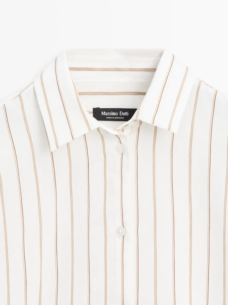 Рубашка в полоску белого цвета