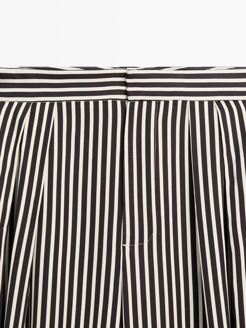 Полосатые брюки с запахом и вытачками