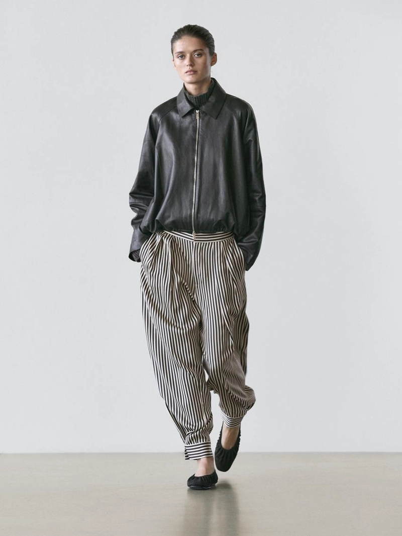 Полосатые брюки с запахом и вытачками