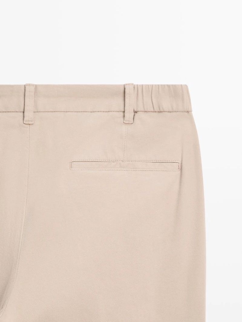 Брюки из хлопкового смесового материала в зауженном крое