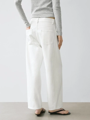 Джинсы с завышенной талией и свободным кроем- Заказать в России