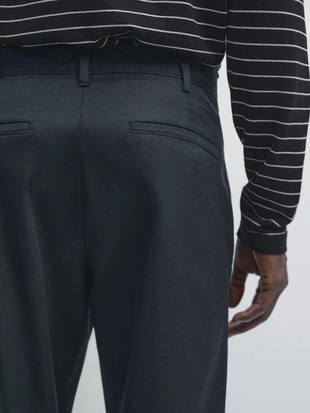Брюки из смесового хлопка в узком крое- Заказать в России
