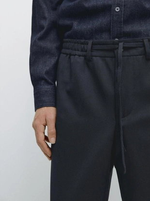 Брюки из шерсти с текстурой- Заказать в России