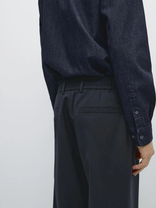 Брюки из шерсти с текстурой- Заказать в России