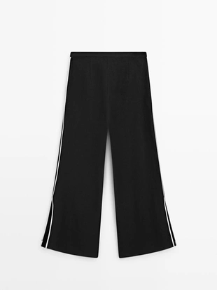 Льняные брюки с контрастным обрамлением- Заказать в России