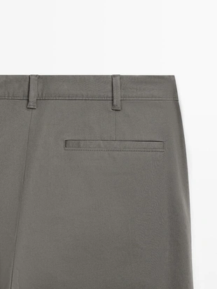 Хлопковые брюки приталенного кроя из смесовой ткани MASSIMO DUTTI- Заказать в России