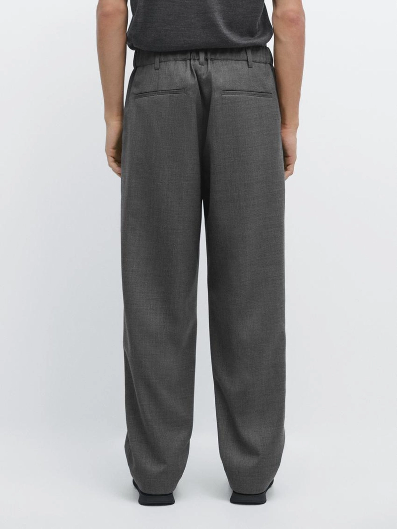 Брюки из шерсти свободного кроя с деталями вытачек