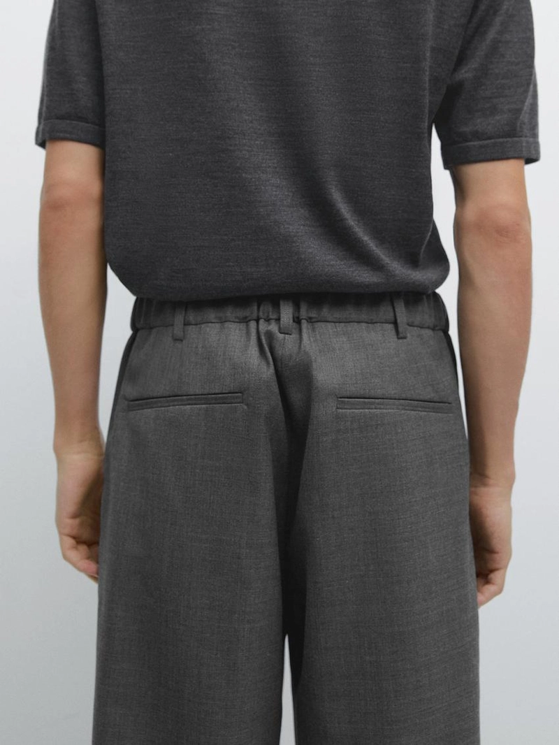 Брюки из шерсти свободного кроя с деталями вытачек