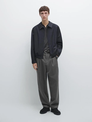 Брюки из шерсти свободного кроя с деталями вытачек- Заказать в России