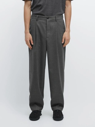 Брюки из шерсти свободного кроя с деталями вытачек- Заказать в России