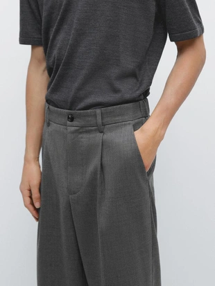 Брюки из шерсти свободного кроя с деталями вытачек- Заказать в России