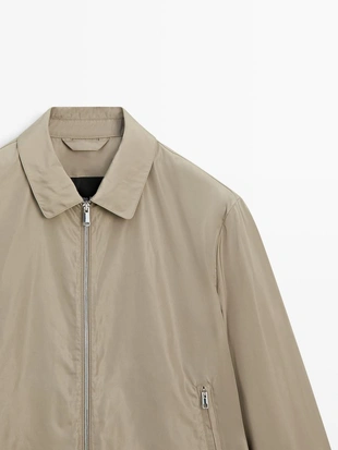 Куртка из легкого материала- Заказать в России