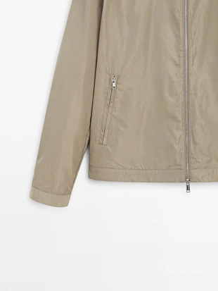 Куртка из легкого материала- Заказать в России