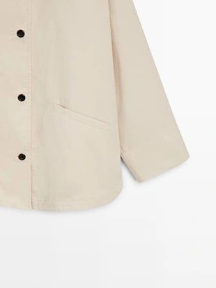 Куртка с деталями высокого воротника- Заказать в России