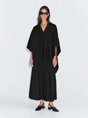 Короткая вязаная накидка с V-образным вырезом- Заказать в России