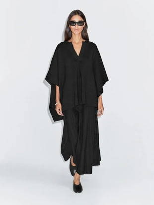 Короткая вязаная накидка с V-образным вырезом- Заказать в России