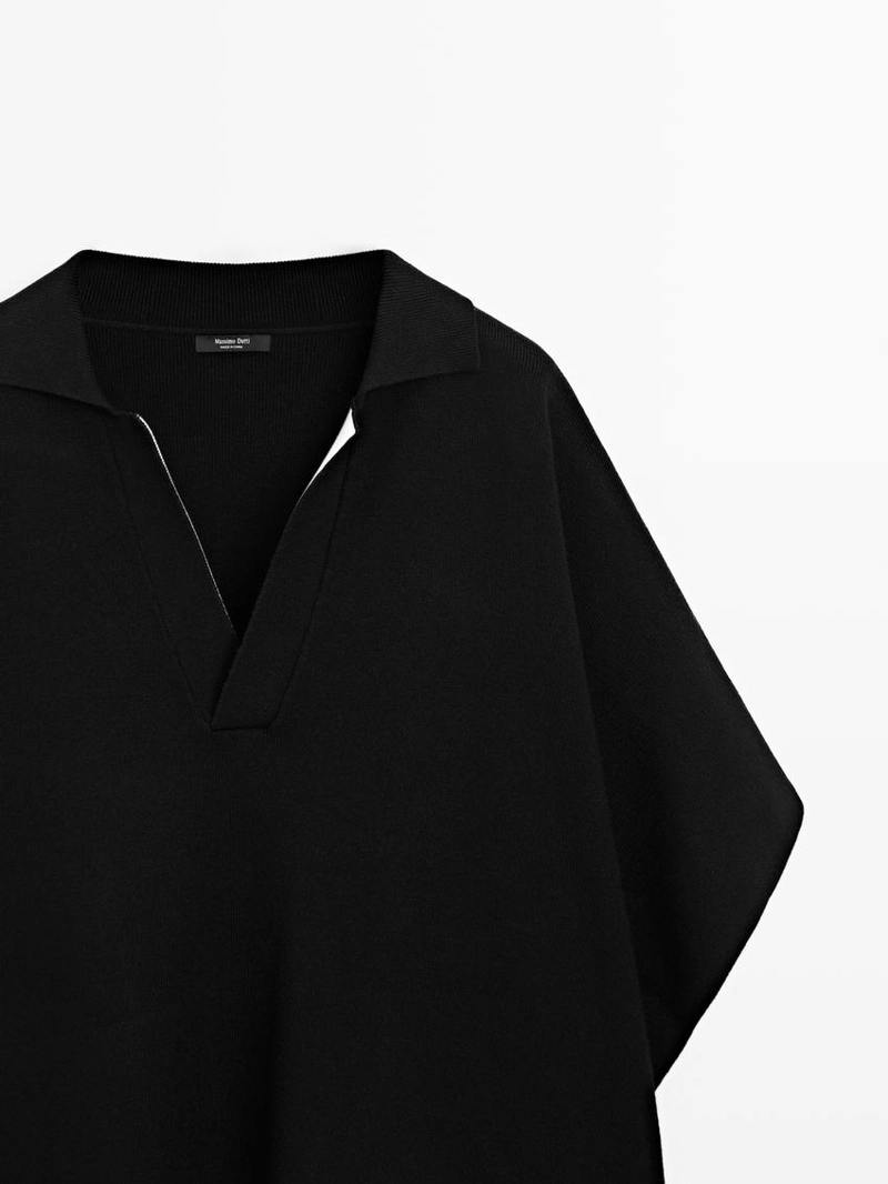 Короткая вязаная накидка с v-образным вырезом