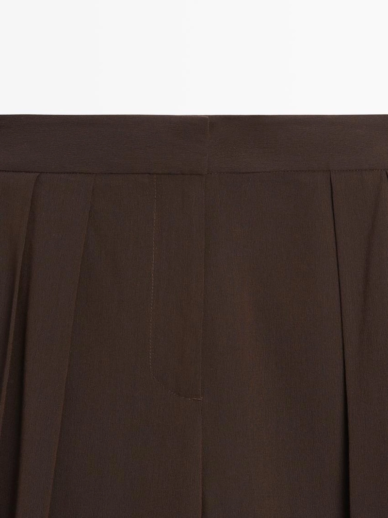 Брюки-саруэль с защипами