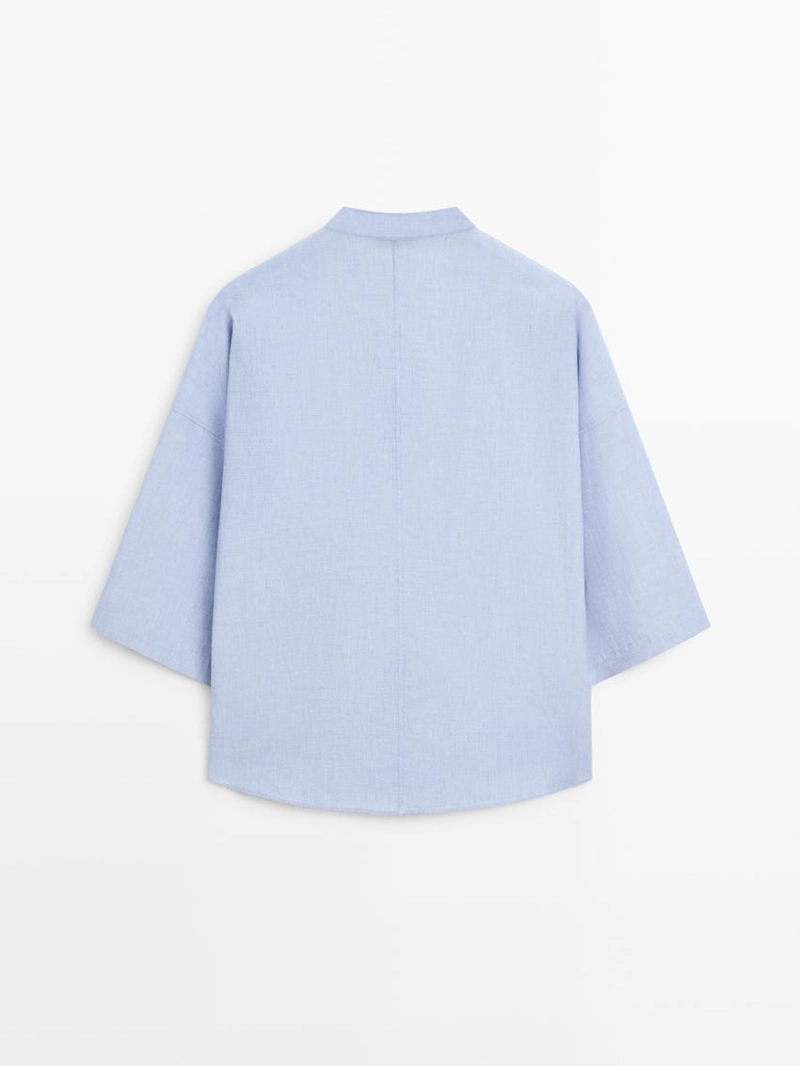 Блузка с потайным воротником на пуговицах