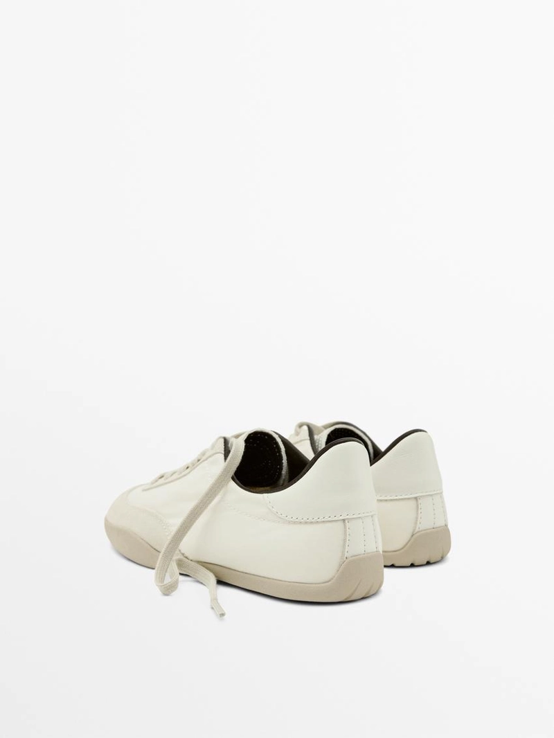 Кроссовки с контрастной отделкой