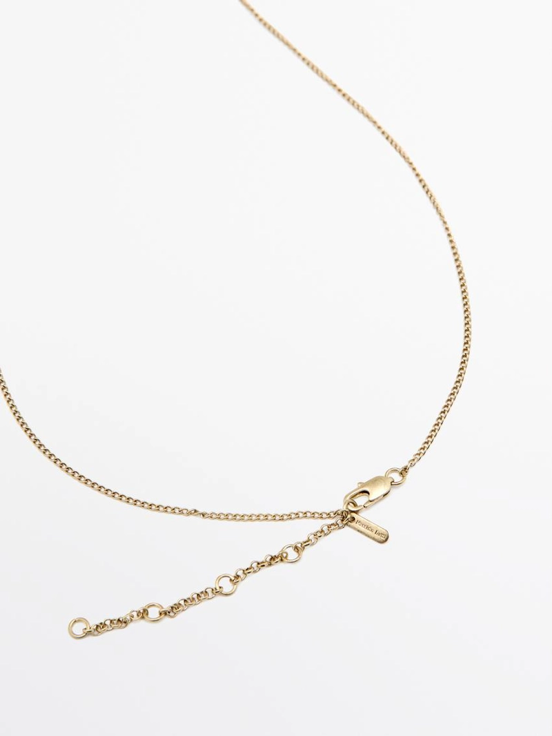 Ожерелье с металлическим подвеском