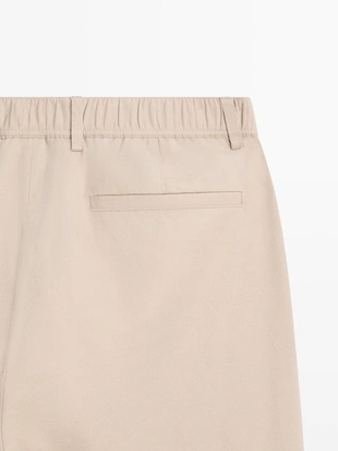 Брюки в стиле jogger fit из хлопковой смеси- Заказать в России