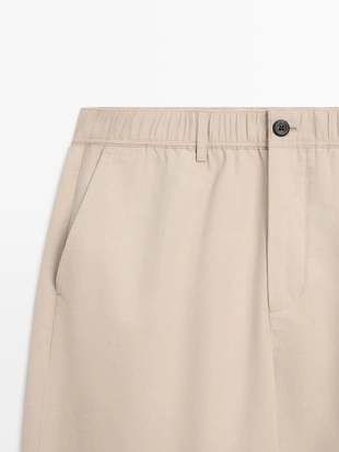 Брюки в стиле jogger fit из хлопковой смеси- Заказать в России