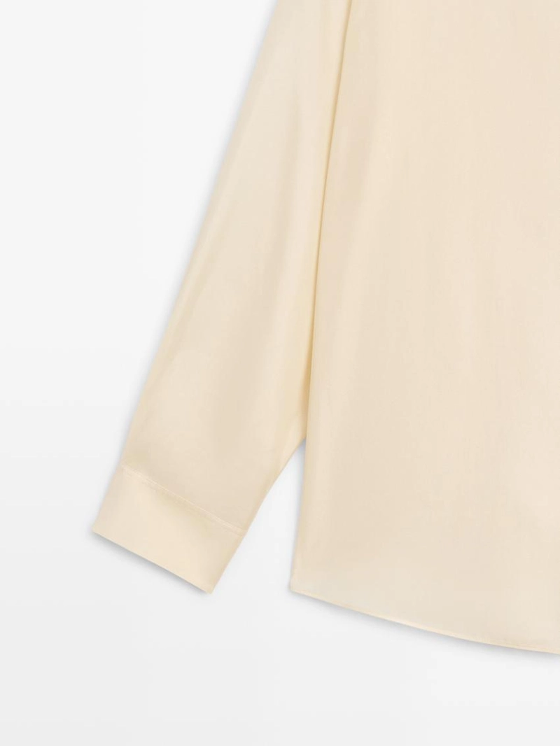 Блузка из шелка с деталями на пуговицах