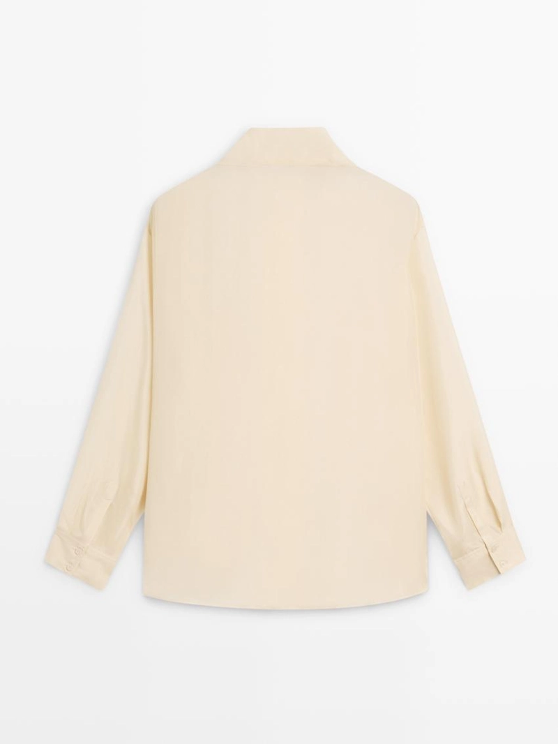 Блузка из шелка с деталями на пуговицах