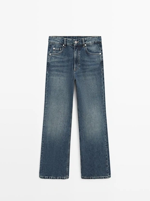 Джинсы синего цвета со средней посадкой и расклешенными штанинами- Заказать в России