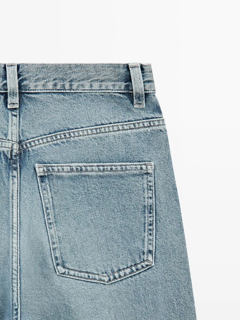 Джинсы с высокой талией и разрезом внизу