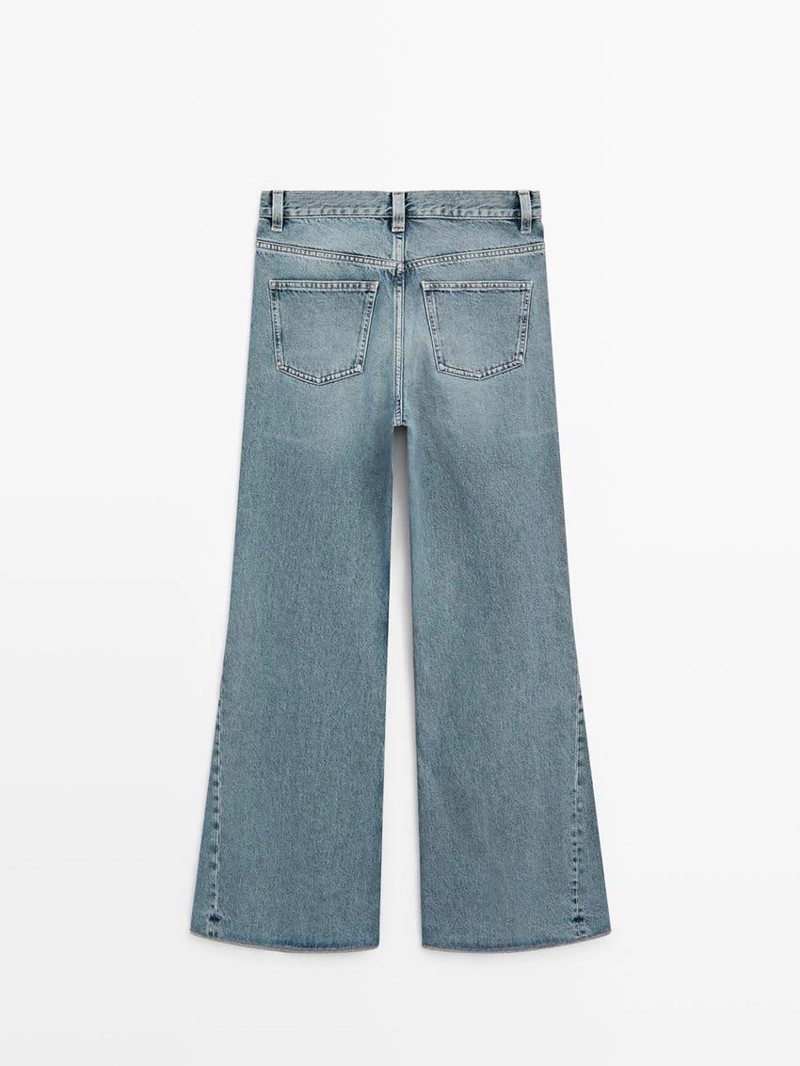 Джинсы с высокой талией и разрезом внизу