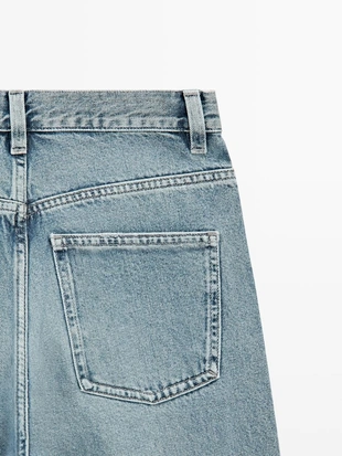 Джинсы с высокой талией и разрезом внизу- Заказать в России