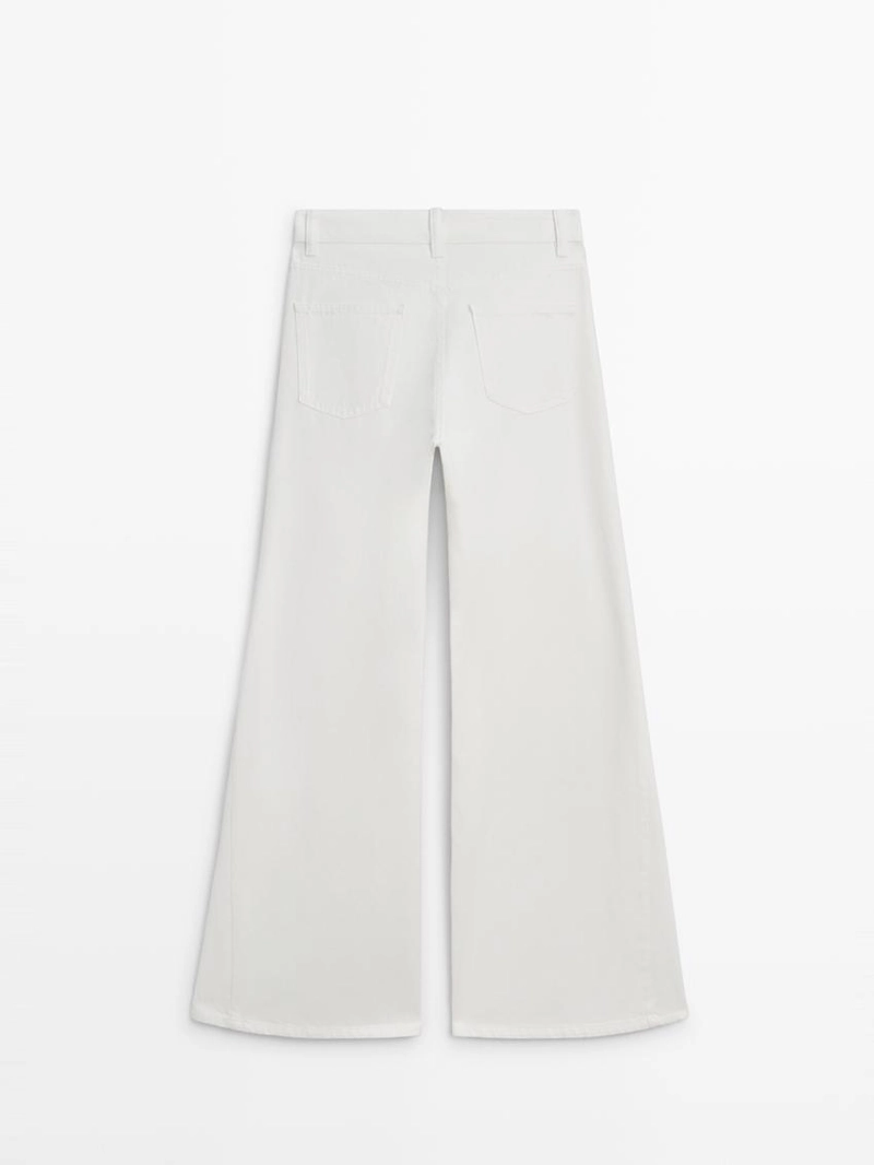 Джинсы свободного кроя с высокой посадкой