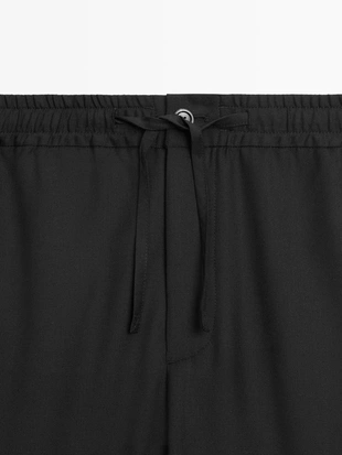 Брюки из шерсти свободного кроя- Заказать в России