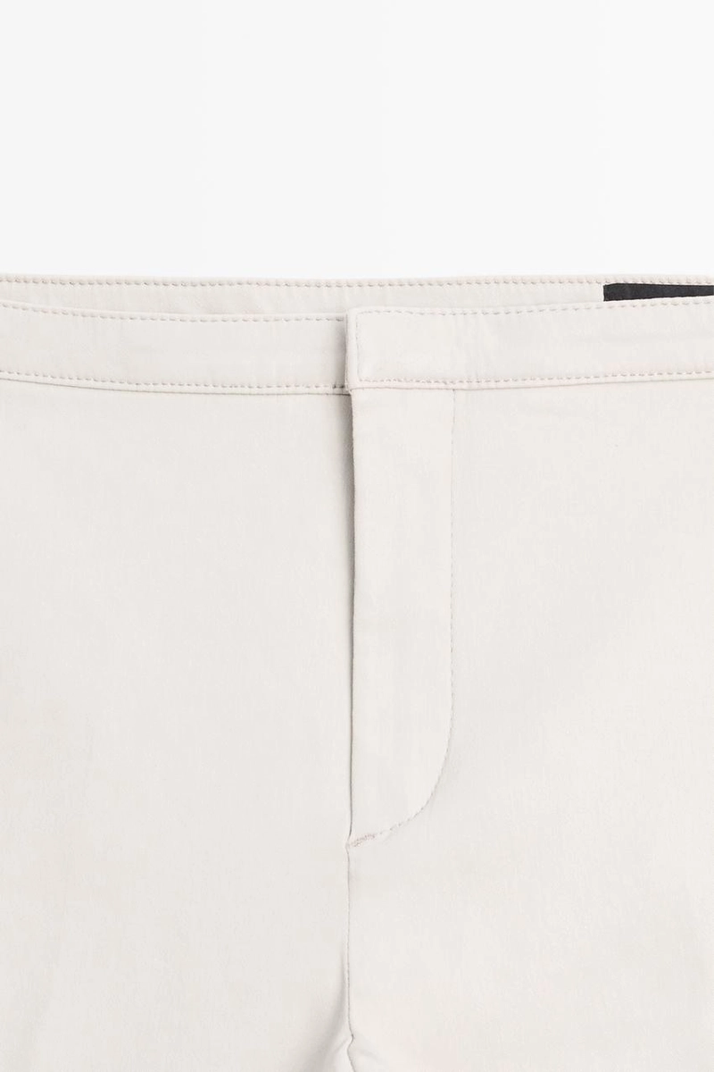 Брюки со средней посадкой и расклешенным кроем