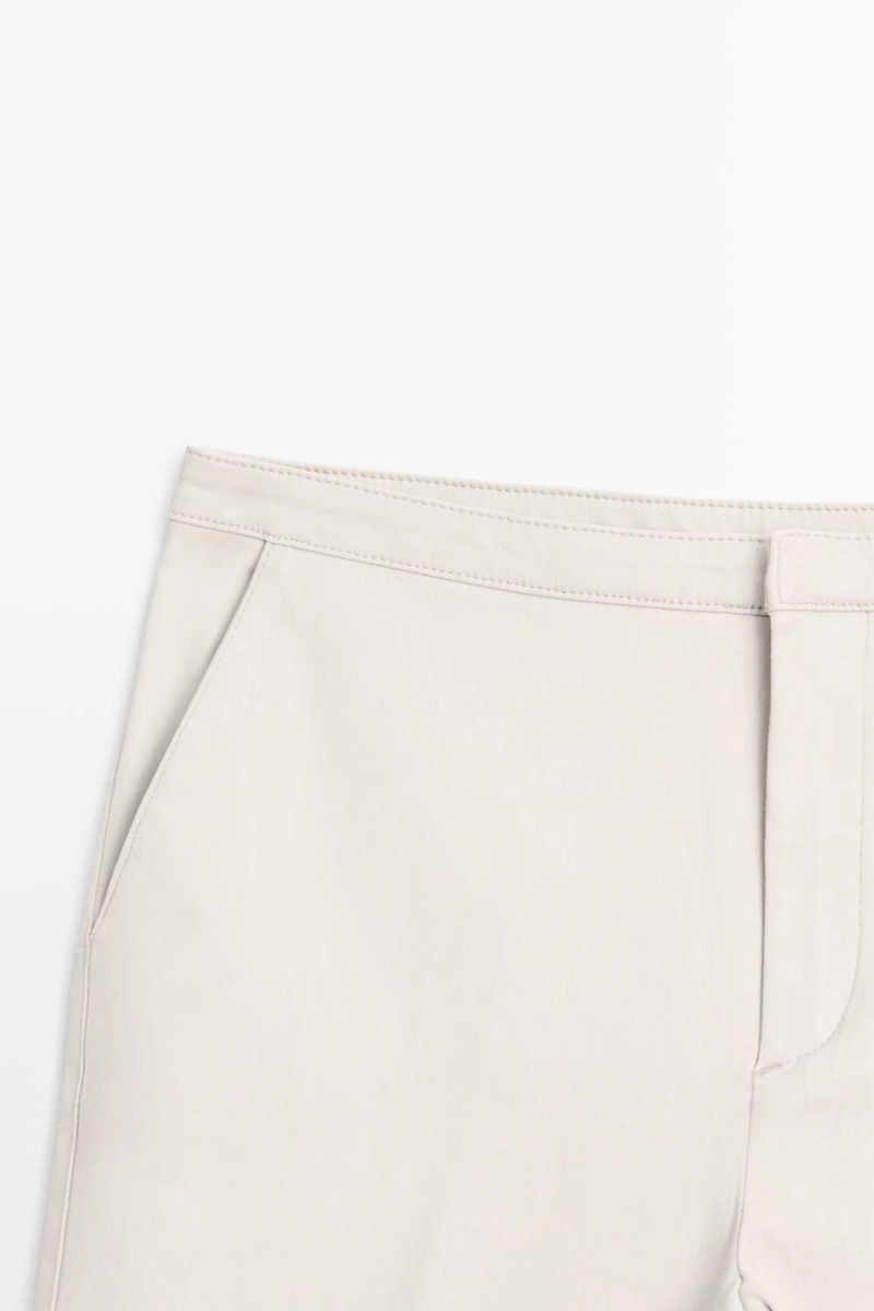 Брюки со средней посадкой и расклешенным кроем