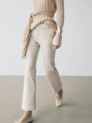 Брюки со средней посадкой и расклешенным кроем- Заказать в России