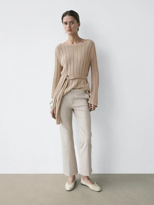 Брюки со средней посадкой и расклешенным кроем- Заказать в России