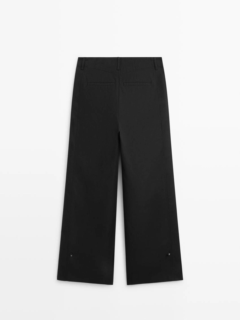 Брюки из хлопково-шелковой смеси с деталями на подоле