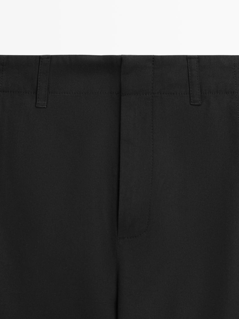 Брюки из хлопково-шелковой смеси с деталями на подоле