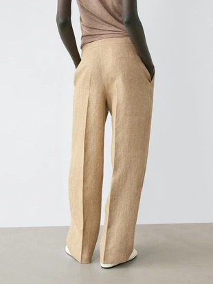 Брюки из льна с деталями вытачек- Заказать в России