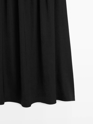 Юбка-миди с контрастными деталями- Заказать в России